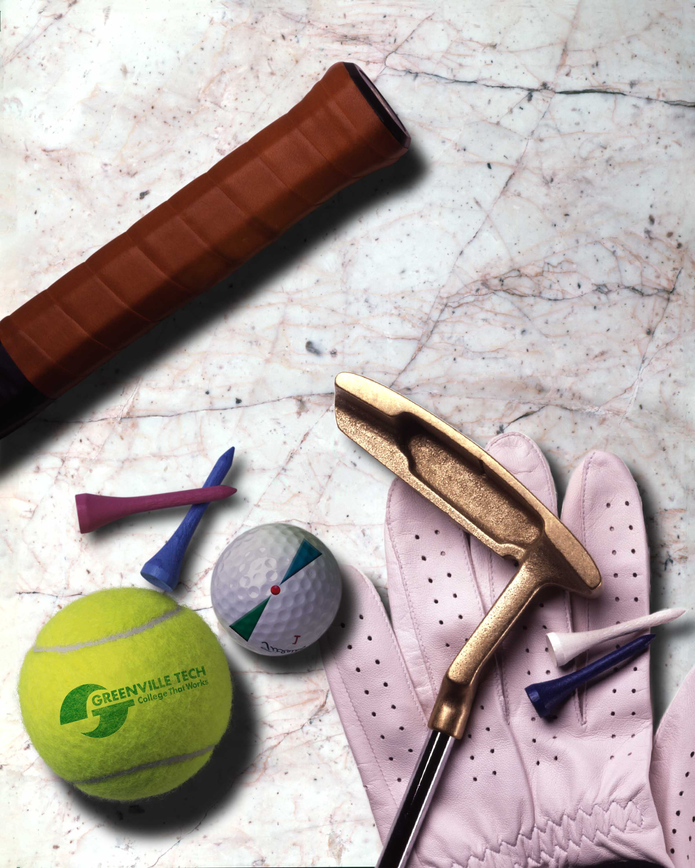 sports equipment against a marble surface